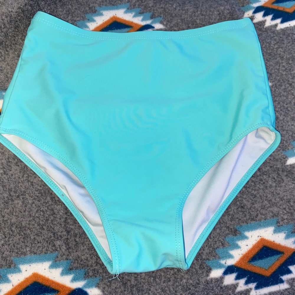 Light blue high waisted bikini bottoms. Never used